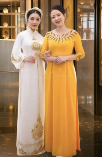 Áo dài mẹ cô dâu chú rể chất liệu lụa mỹ màu vàng đồng trẻ trung ADL110 có bigsize