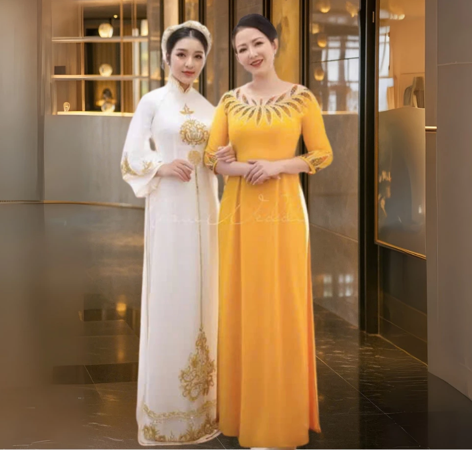Áo dài mẹ cô dâu chú rể chất liệu lụa mỹ màu vàng đồng trẻ trung ADL110 có bigsize