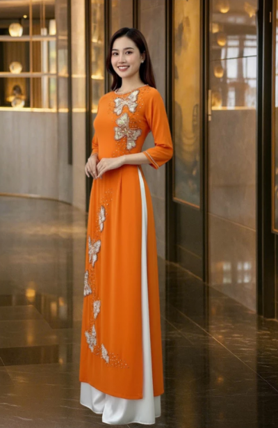 Áo dài mẹ cô dâu màu vàng cam chất liệu lụa tơ ý thiết kế 4 tà cao cấp ADM22